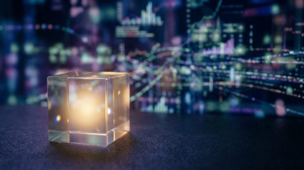 A glowing crystal cube brings focus to a chaotic, blurred digital landscape of blue, purple, and green data points.